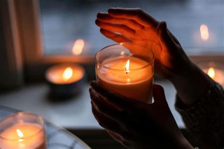 How do I get my candle to burn evenly?