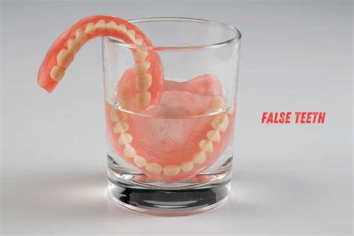 What are the pros and cons of false teeth?