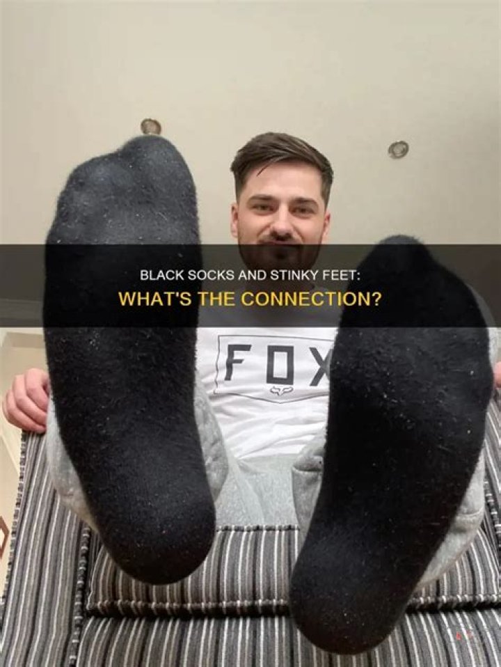 Why do black socks make feet stink?